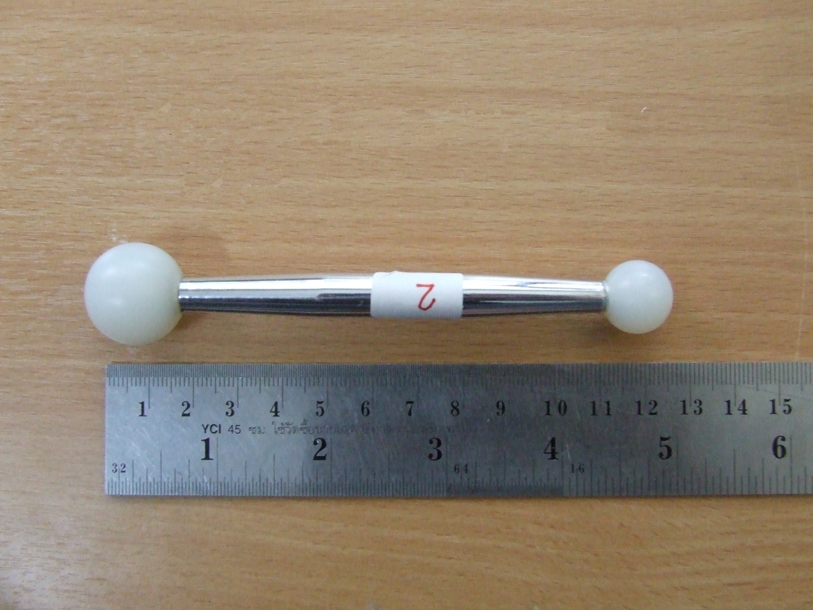 Plastic head dumbel 20 mm.