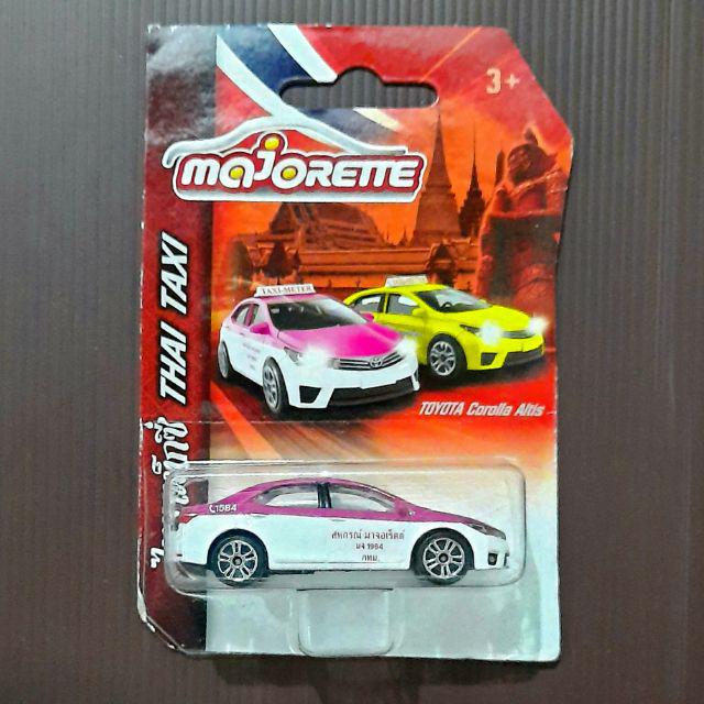โมเดลรถเหล็ก Thai Taxi ผลิตจากโลหะผสมอัตราส่วน 1 : 64 สีชมพู-ขาว