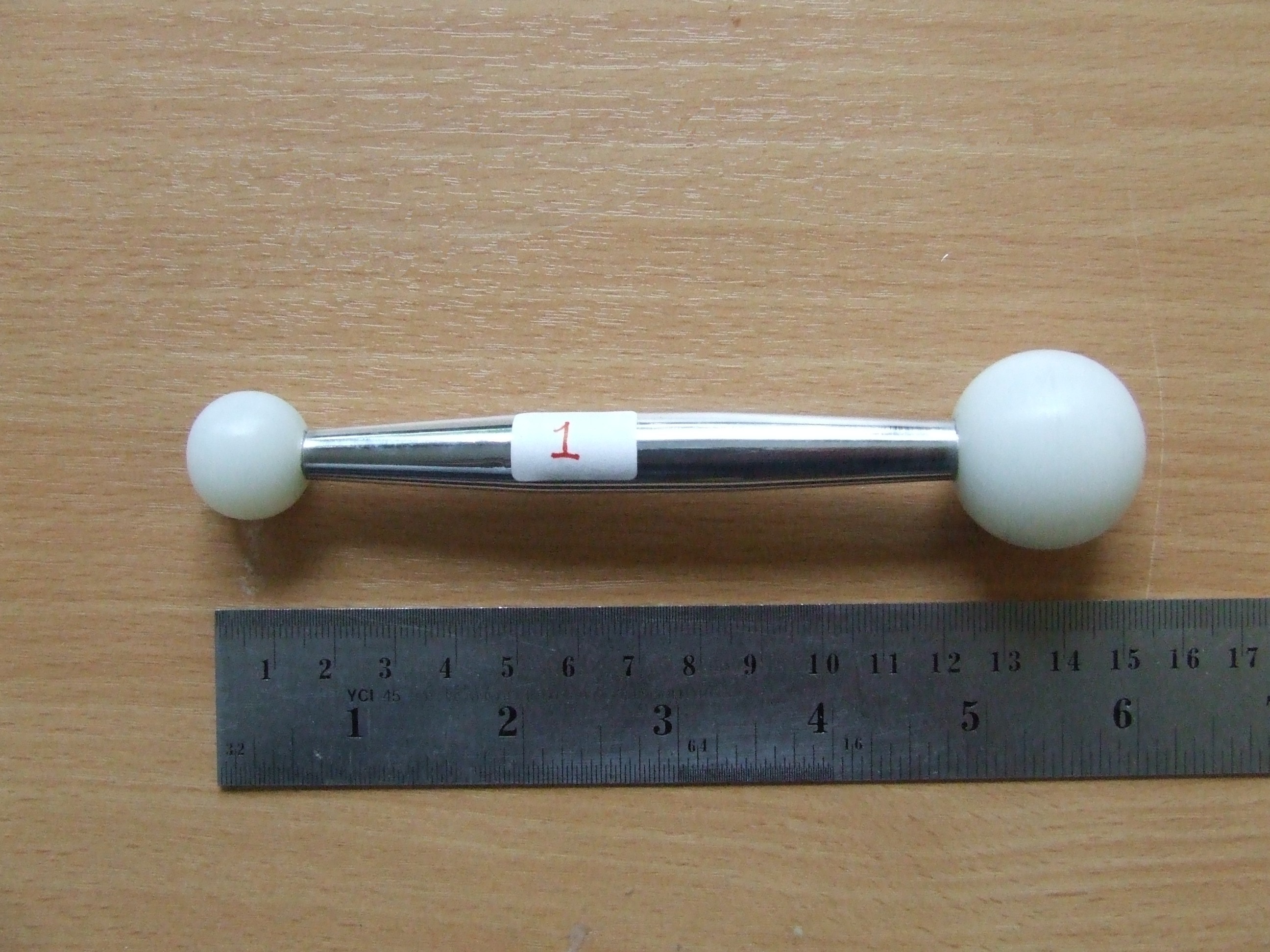 Plastic head dumbel 30 mm.