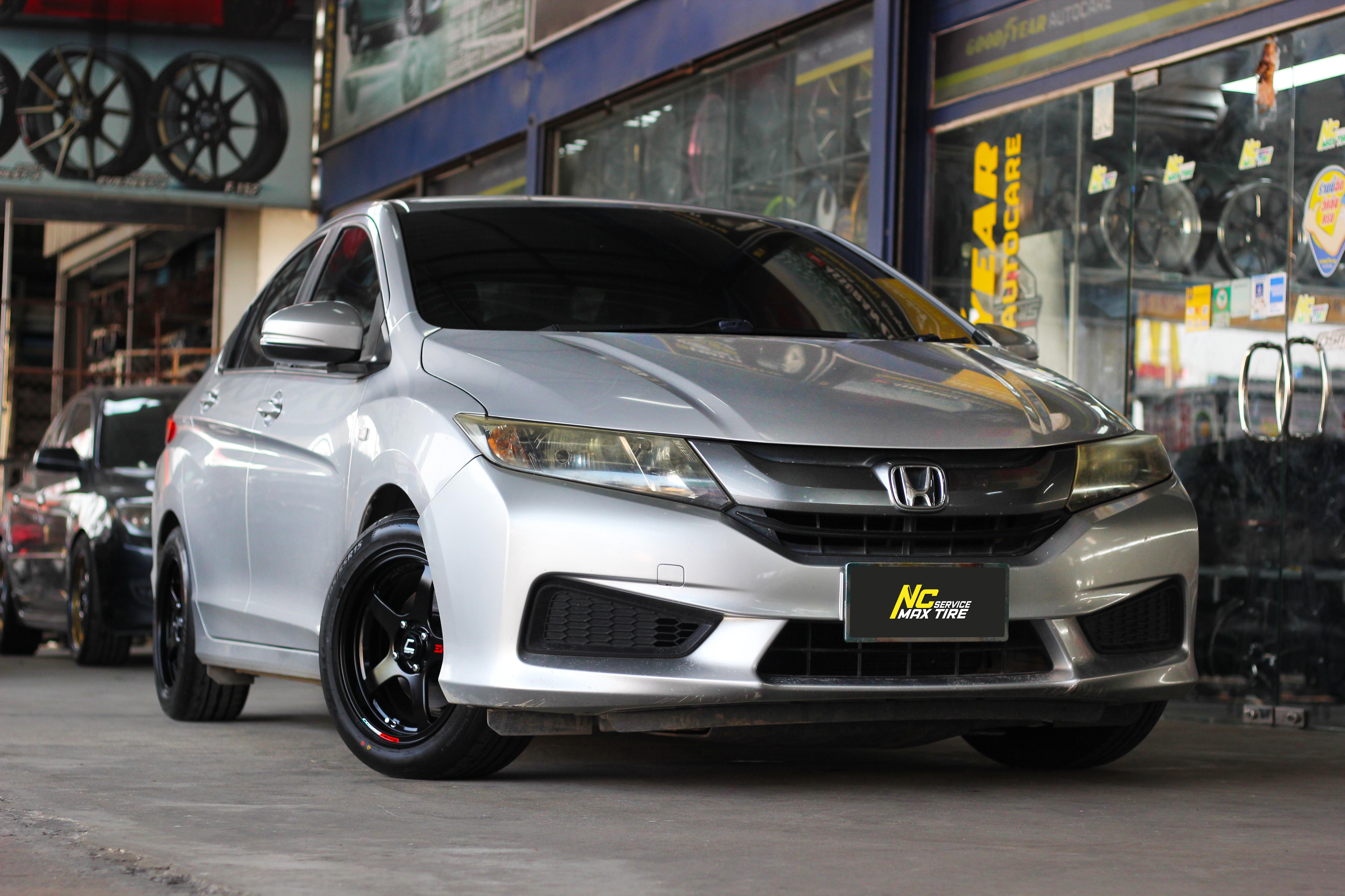 Honda City / ล้อแม็กขอบ15 / Cosmis / Estremo 10TH Anniversary / 15x7.0 4H100 ET35 / ล้อแม็กสีดำด้านทั้งวง+เพลท / ล้อแม็กสำหรับรถเก๋ง City Car , Eco Car / ล้อแม็กสวยๆ / NC