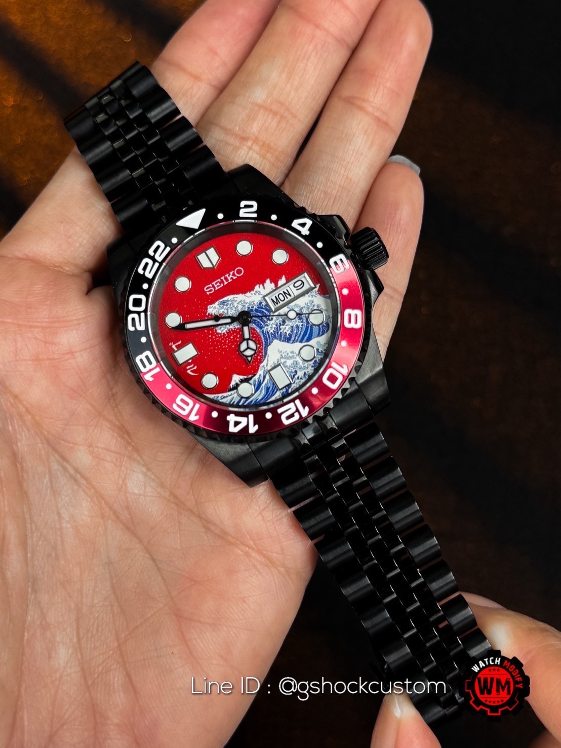 Seikomod Samurai Wave in Black Red Dial Black PVD Jubilee Strap