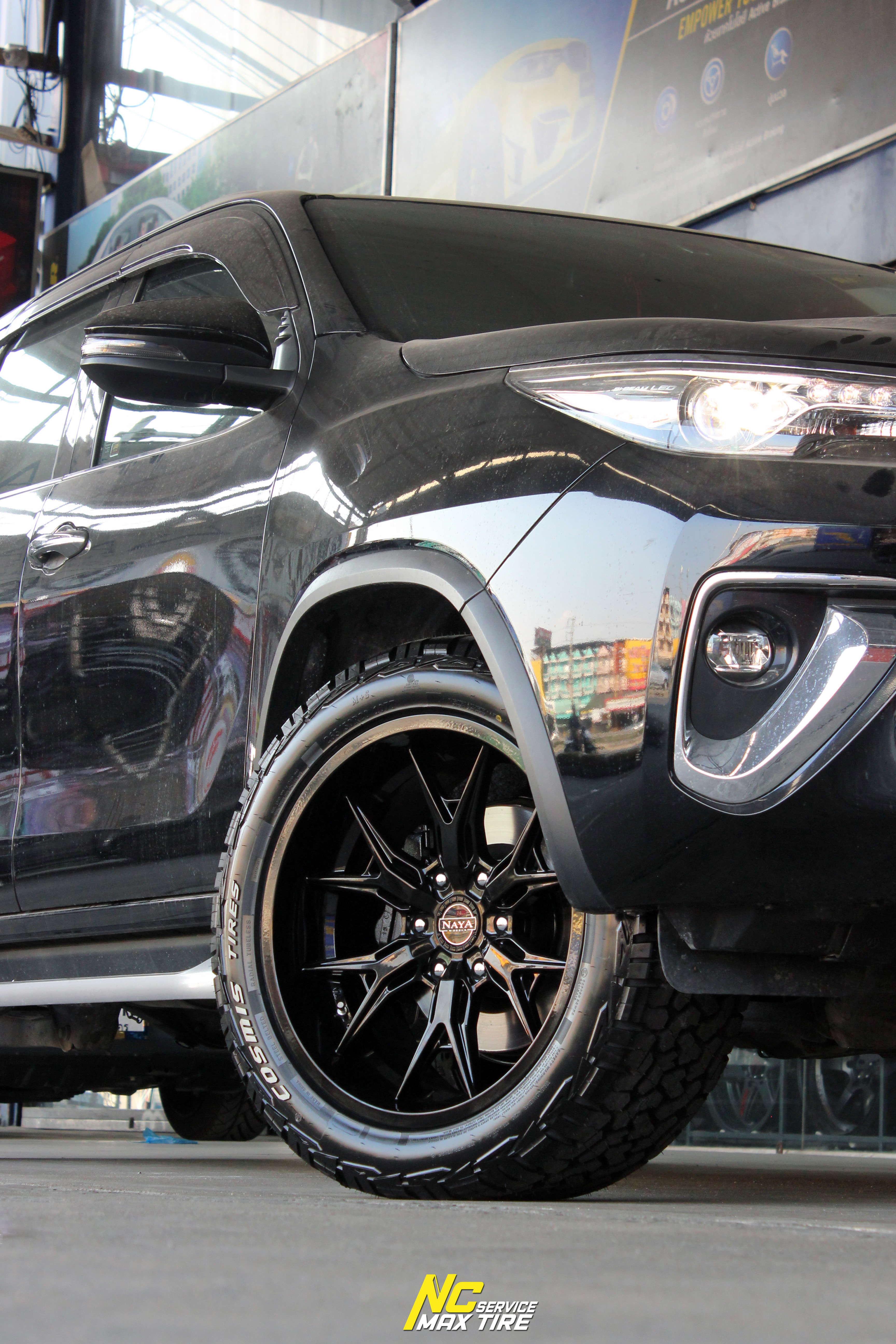 Toyota Fortuner / ล้อแม็กขอบ20 / NAYA / Alpha-T6 / ล้อแม็กสีดำเงาทั้งวง / Raptor AT / 265/50R20 / NCmaxtireService