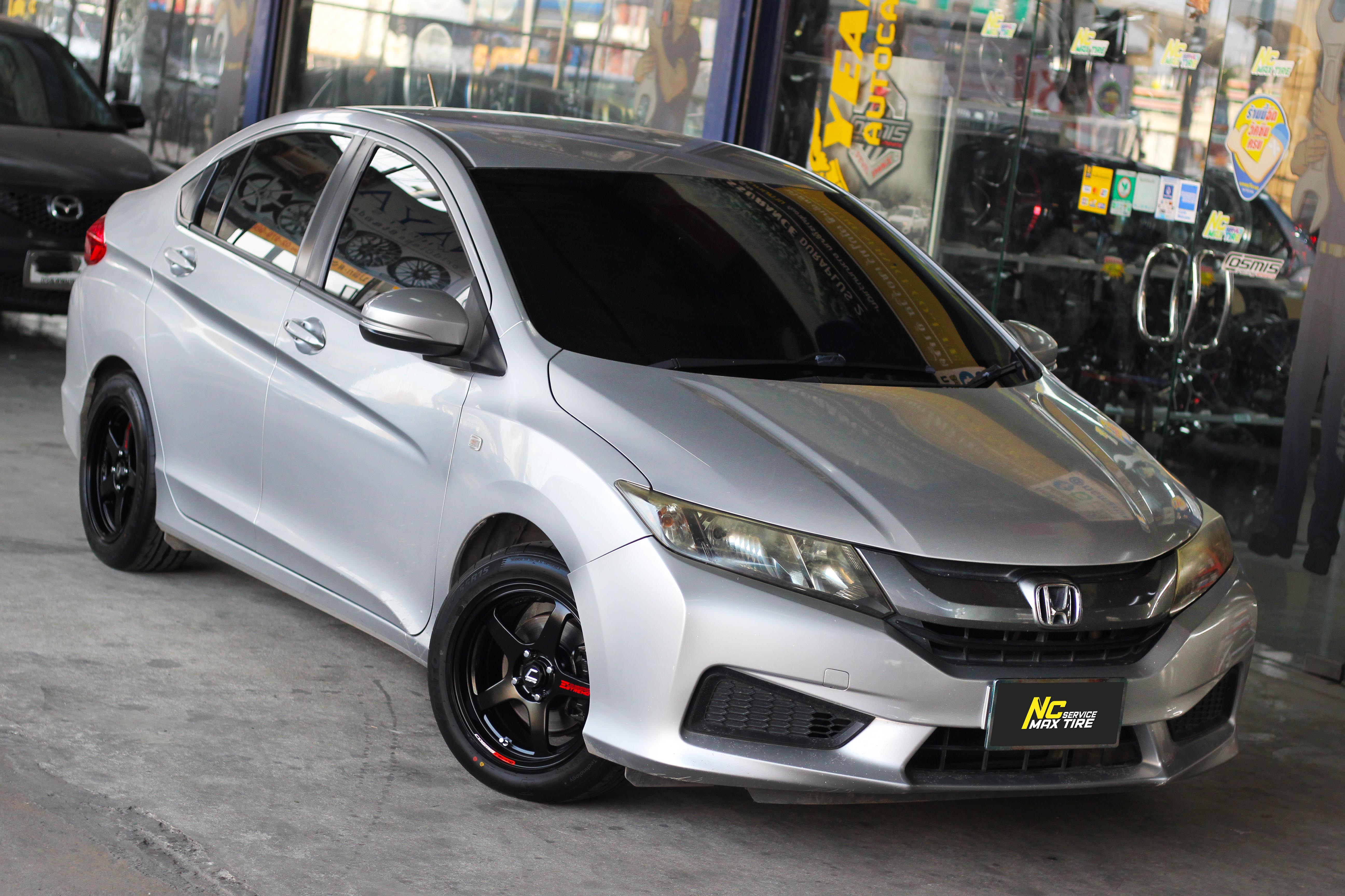Honda City / ล้อแม็กขอบ15 / Cosmis / Estremo 10TH Anniversary / 15x7.0 4H100 ET35 / ล้อแม็กสีดำด้านทั้งวง+เพลท / ล้อแม็กสำหรับรถเก๋ง City Car , Eco Car / ล้อแม็กสวยๆ / NC