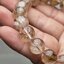 หินคาค็อกซิไนต์ในควอตซ์ใส (Cacoxenite in Clear Quartz)